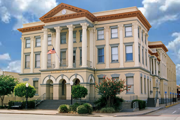 Historic Jefferson Parish Courthouse in Gretna, Louisiana, showcasing classical architecture with prominent columns
