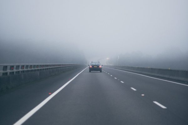 car driving in fog